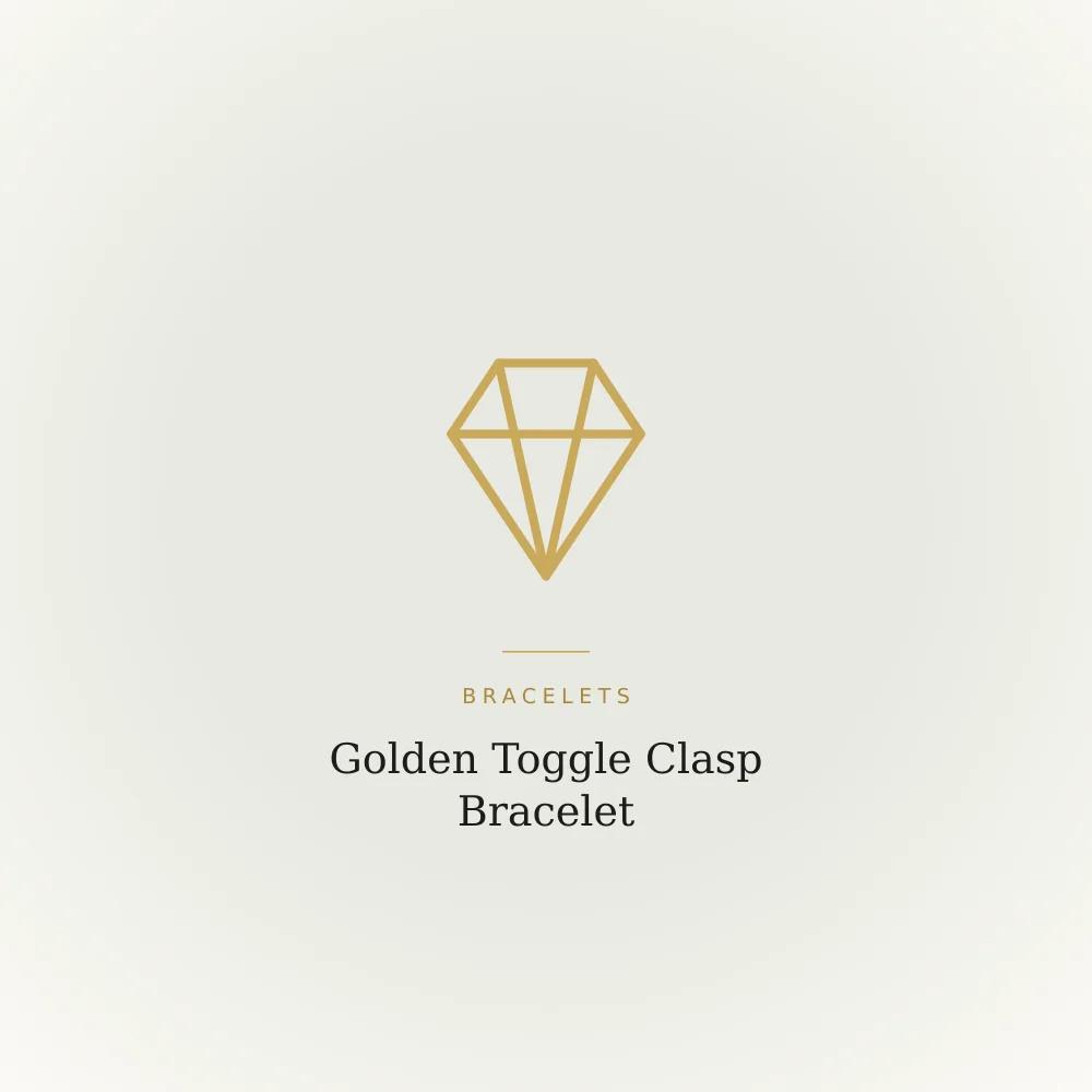 Golden toggle clasp bracelet in brass with a plain rounded band