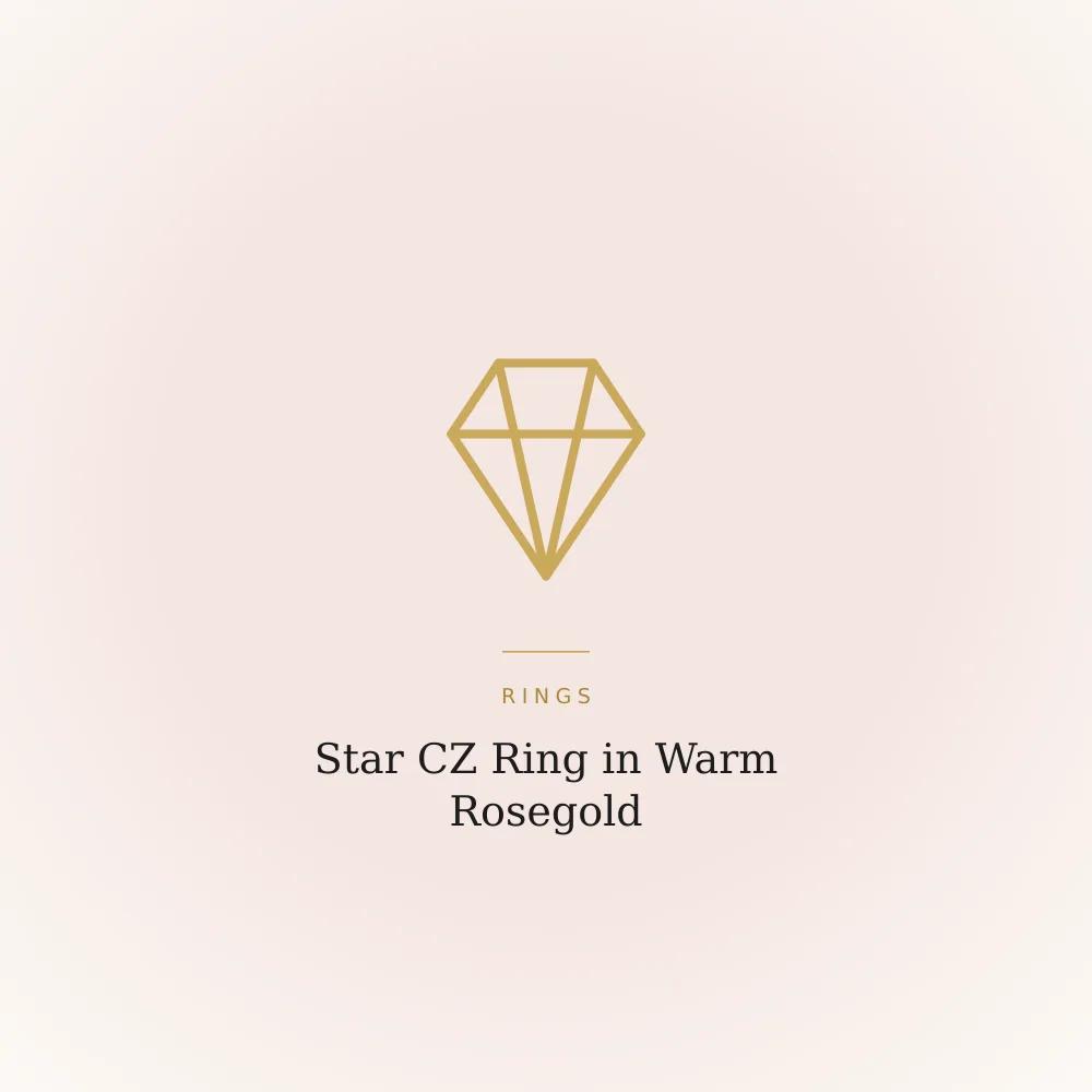 Star-shaped ring in warm rosegold tone set with cubic zirconia stones
