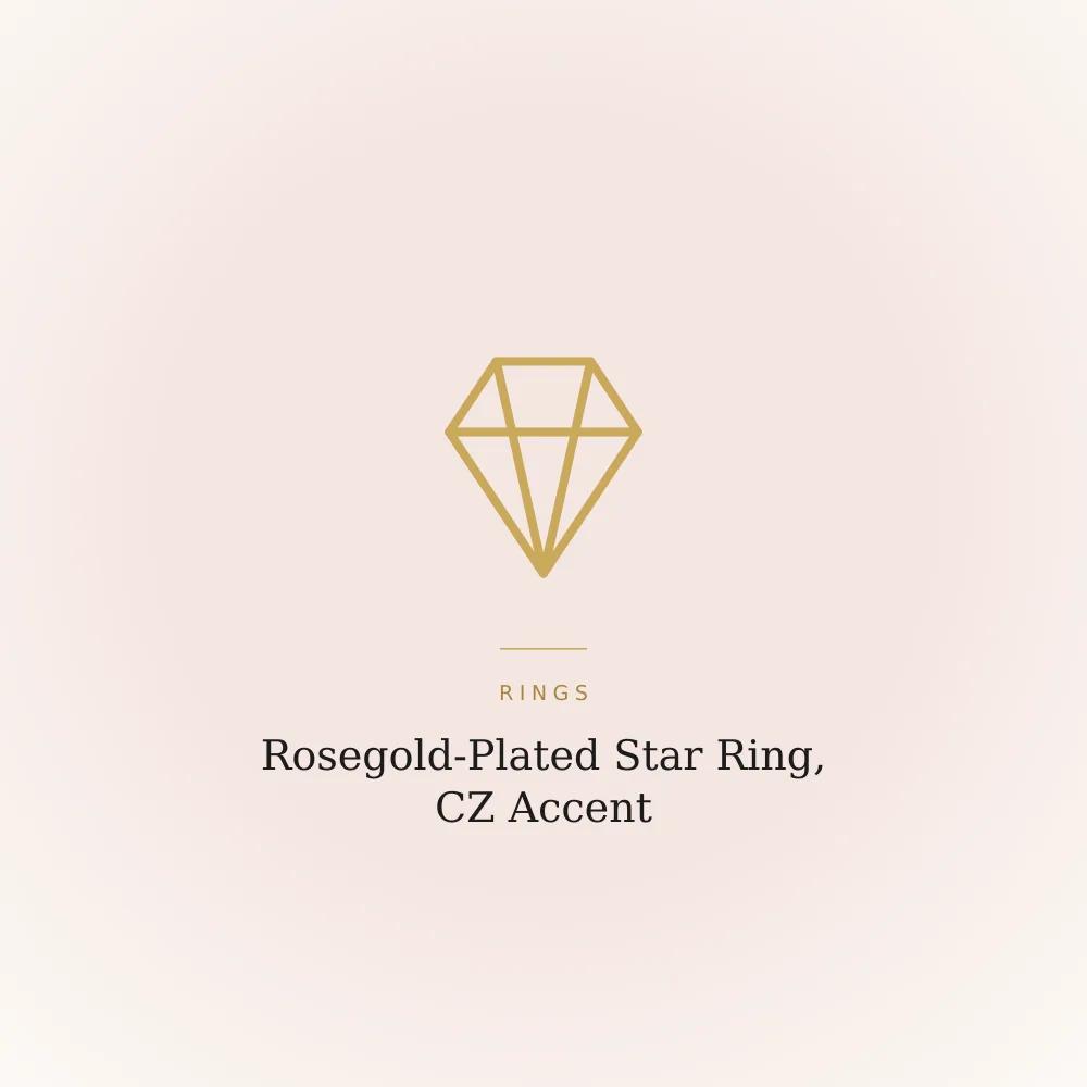 Rosegold-plated star ring accented with cubic zirconia stones on a plain surface