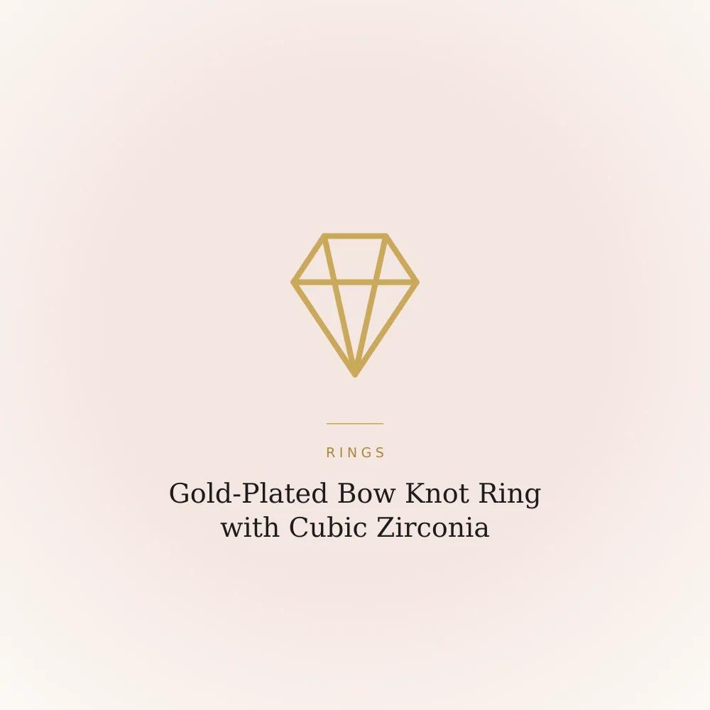 Gold-plated ring with a bow knot design on a layered band, set with cubic zirconia