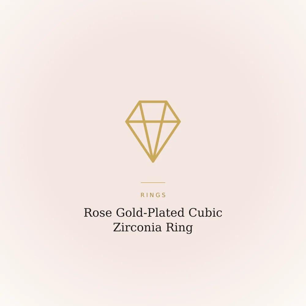 Rose gold-plated ring set with cubic zirconia stones on a brass band