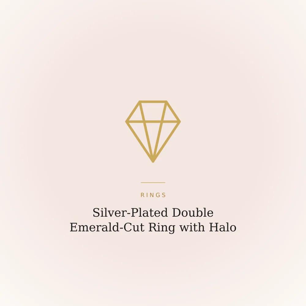 Silver-plated ring with two emerald-cut cubic zirconia stones in halo settings