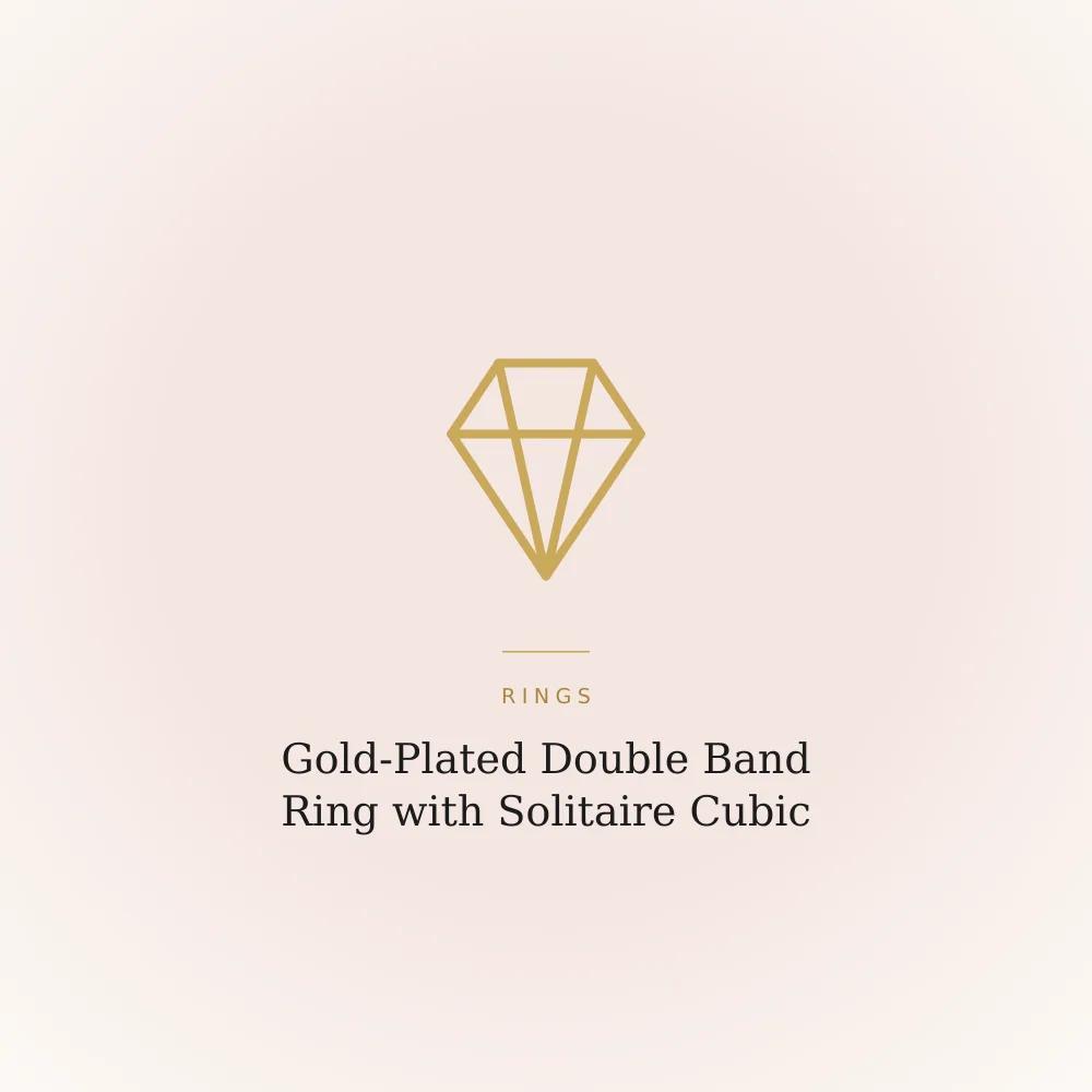Gold-plated ring with a solitaire cubic zirconia stone framed by two separate bands