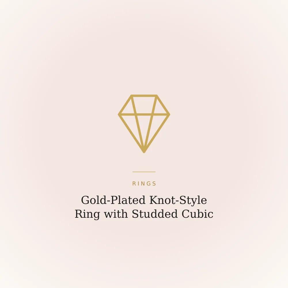 Gold-plated knot-shaped ring studded with cubic zirconia stones along its length