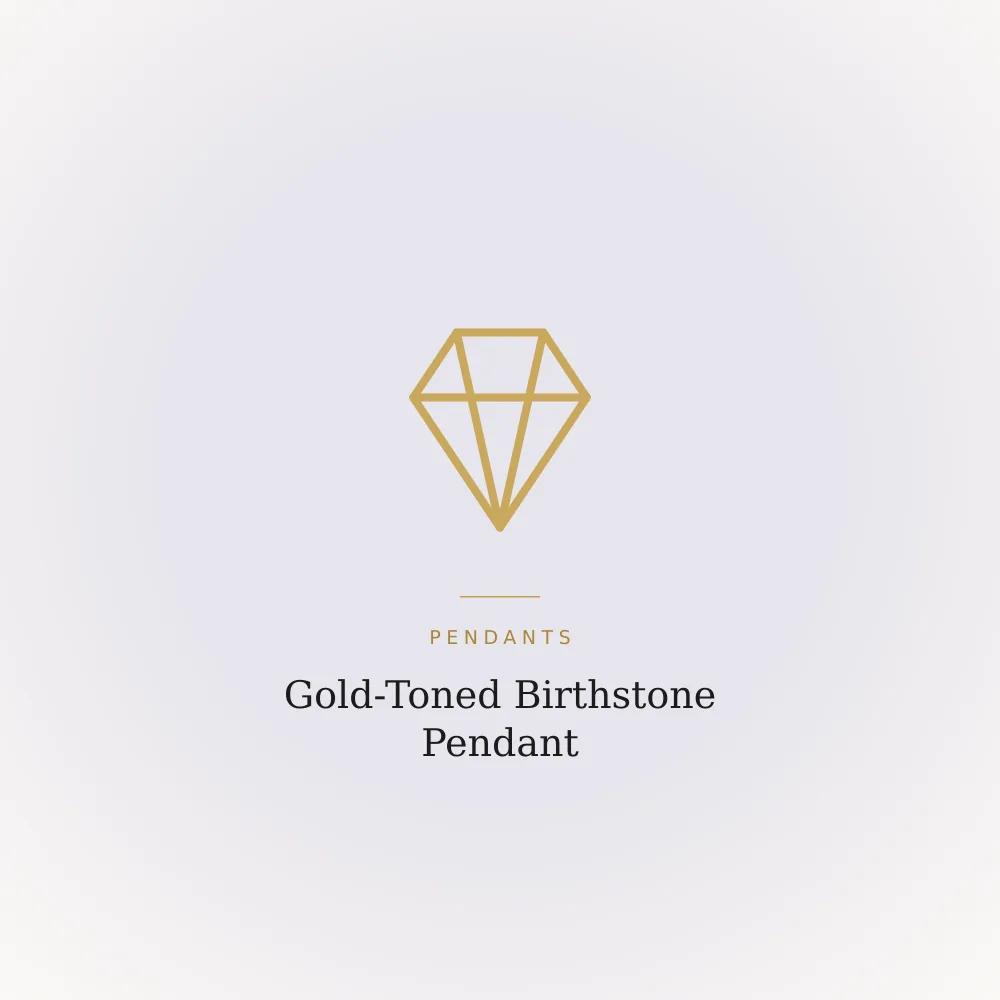 Gold-toned pendant set with a purple or pink synthetic zirconia birthstone