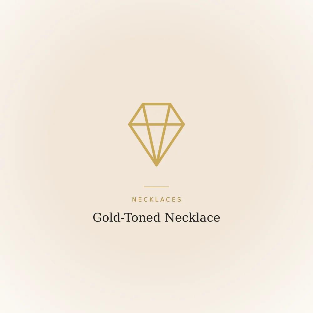 Gold-toned necklace shown against a plain background, simple finish