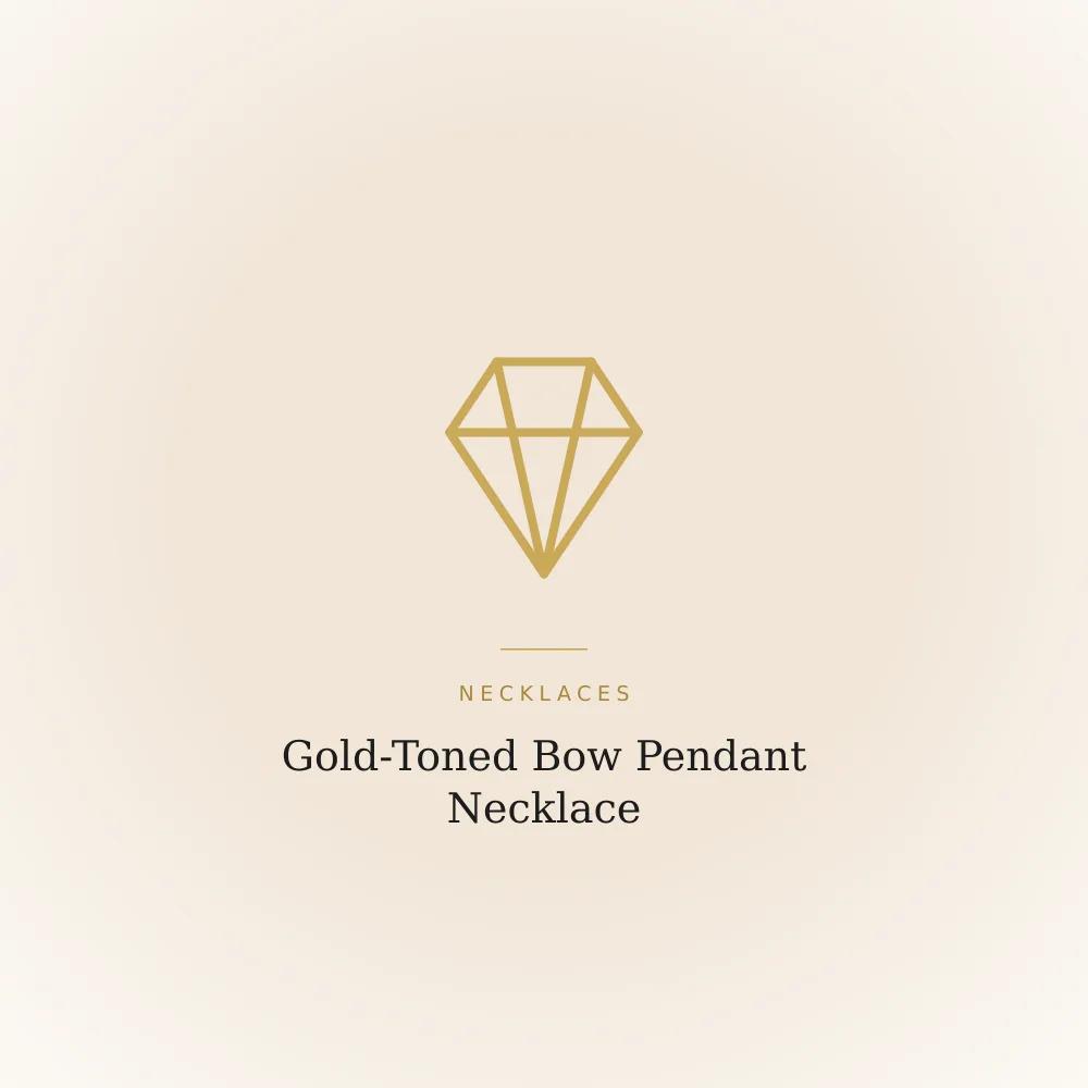Gold-toned bow pendant necklace with a plain ribbon knot and no stones