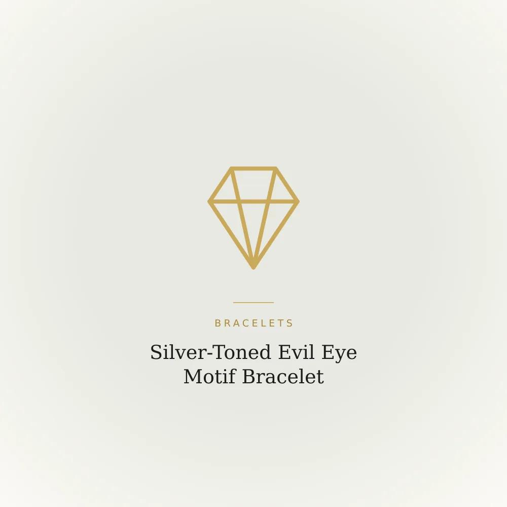 Silver-toned bracelet with a single evil eye charm