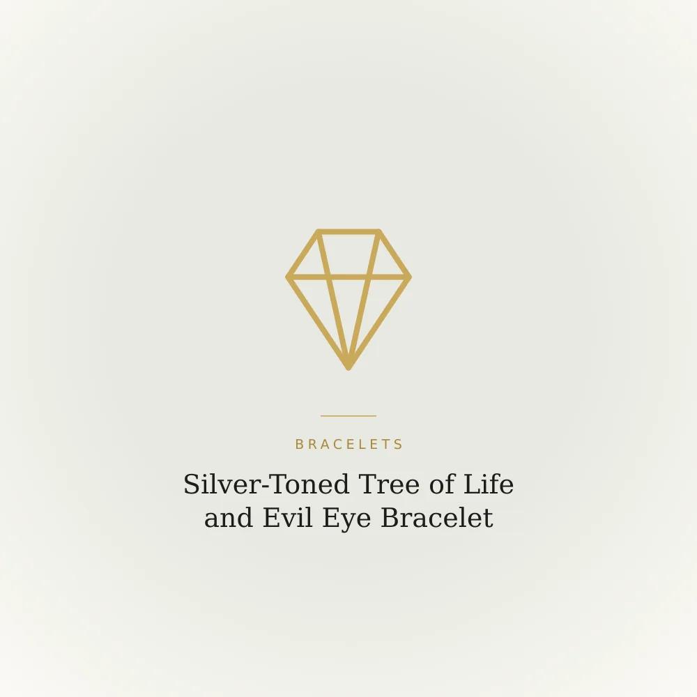 Silver-toned bracelet with a tree of life charm and an evil eye charm