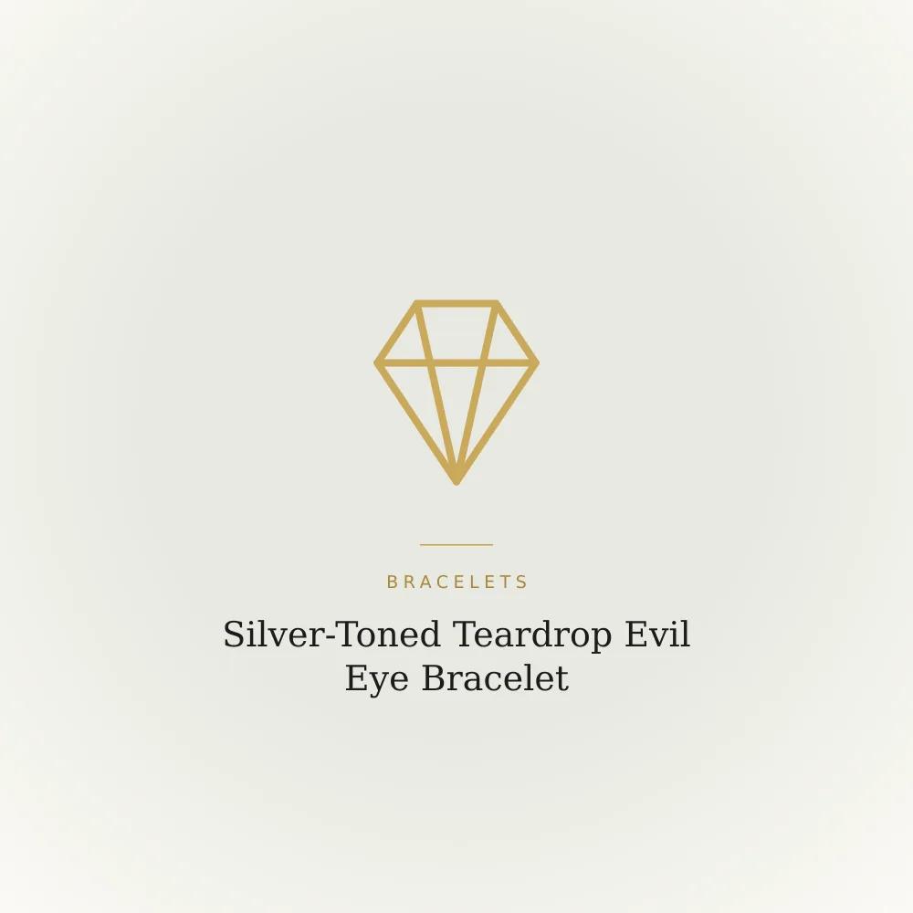 Silver-toned bracelet with a teardrop-shaped evil eye charm
