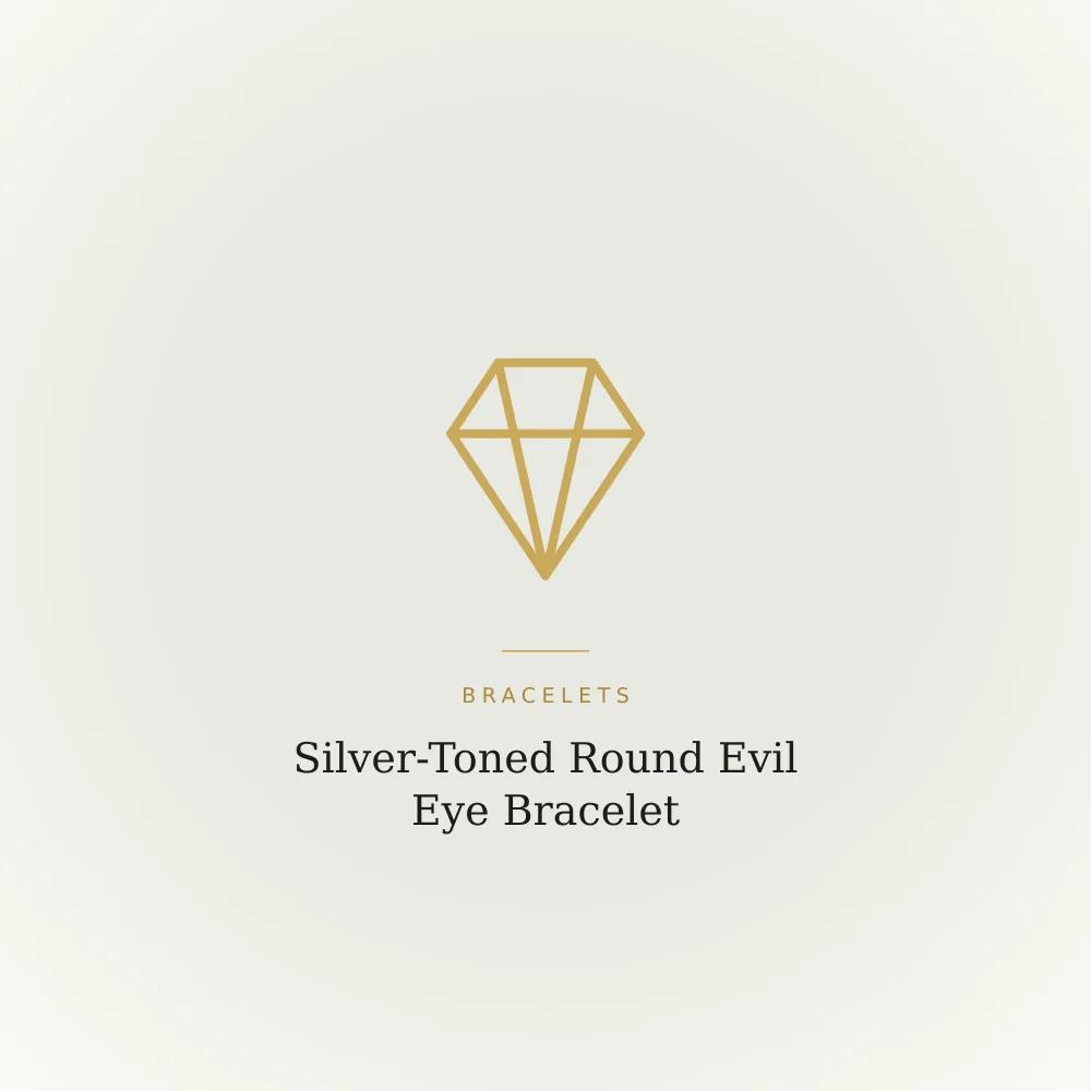 Silver-toned bracelet with a round evil eye charm and a small set stone