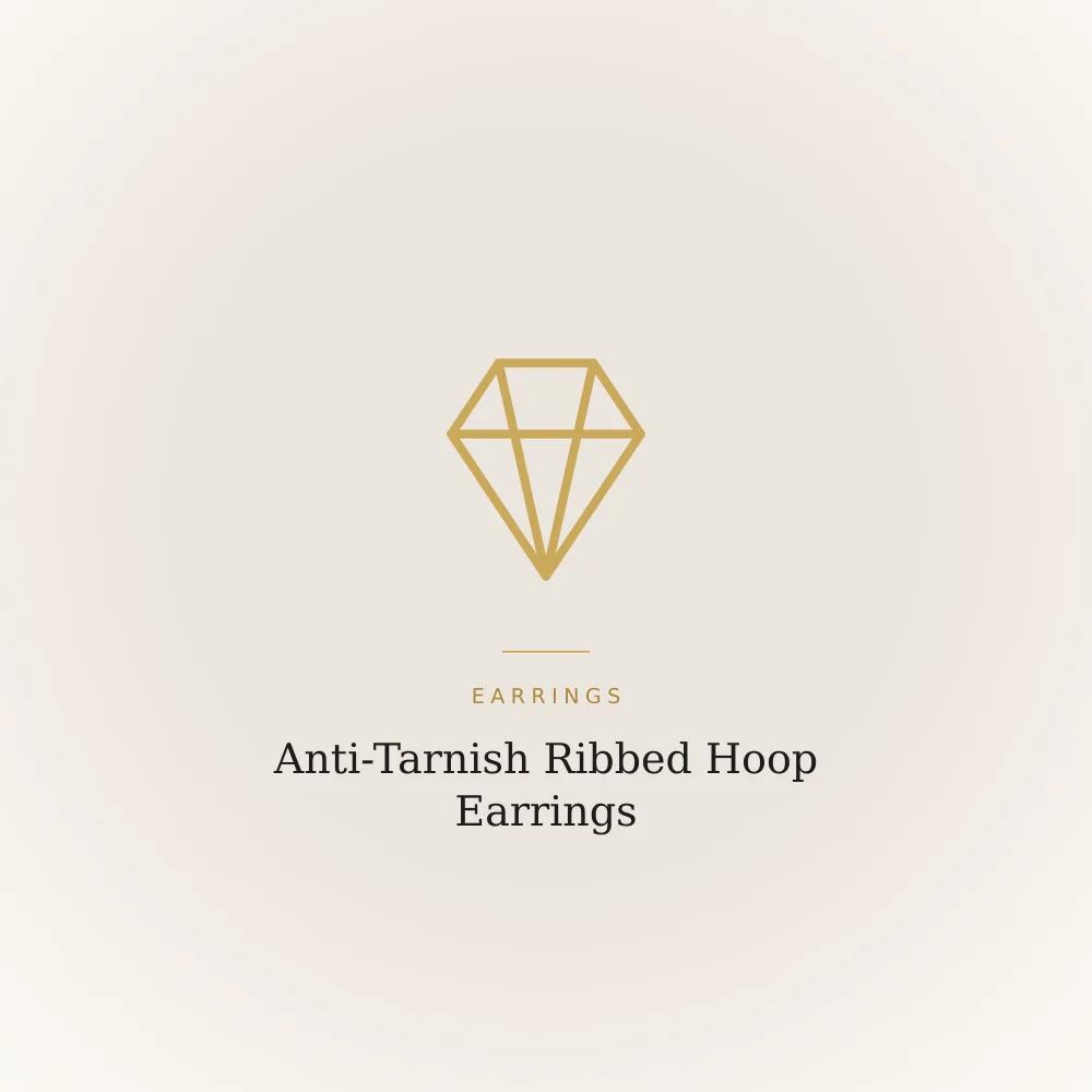 Gold-toned stainless steel hoop earrings with a ribbed texture
