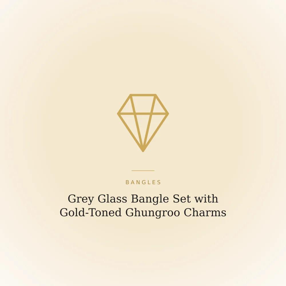 Grey glass bangle set with gold-toned ghungroo bell charm bangles