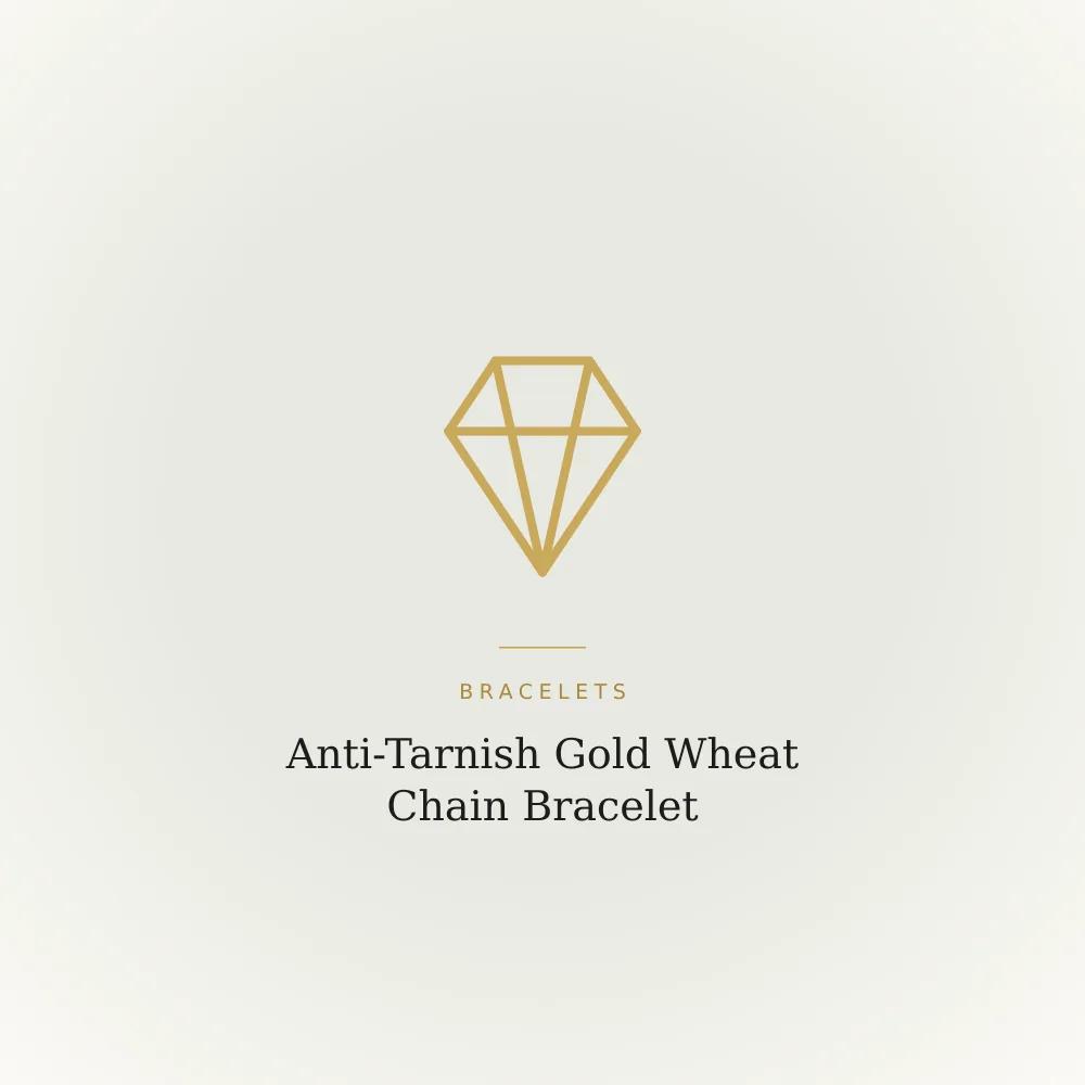 Gold-toned wheat chain bracelet with a braided herringbone pattern and lobster clasp