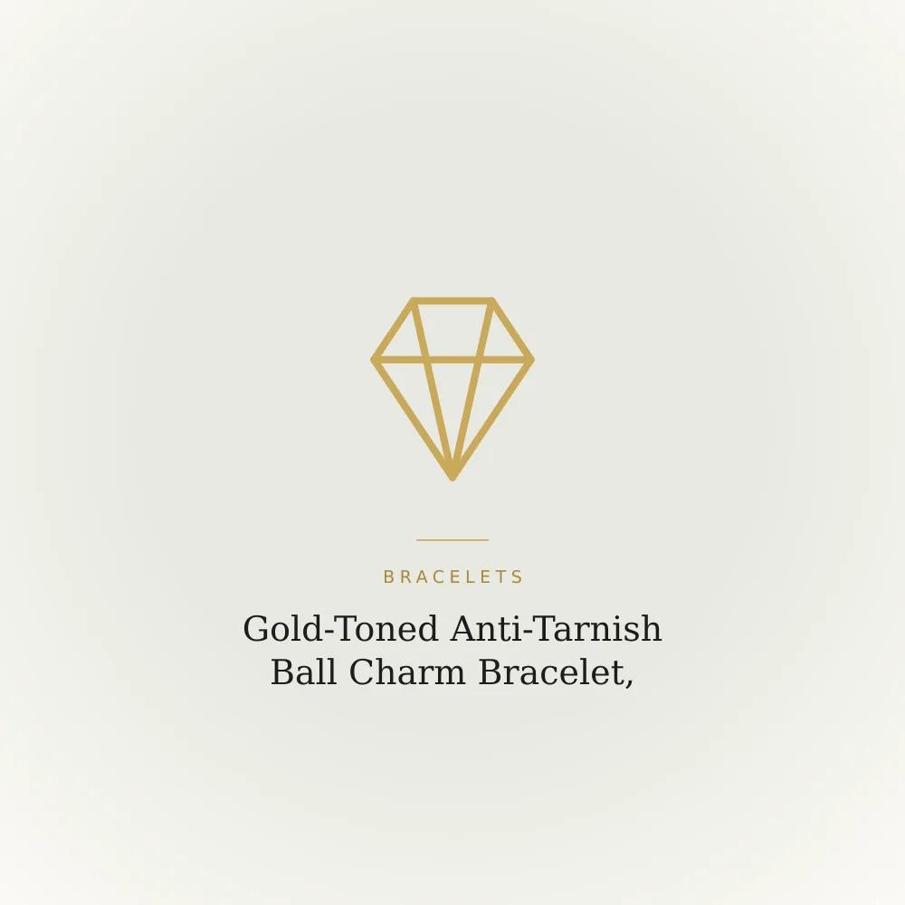 Gold-toned anti-tarnish bracelet with dangling ball charms on a chain