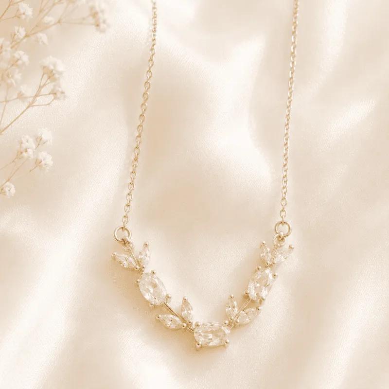 Gold-plated V-shaped vine necklace set with clear cubic zirconia stones and no colour accents