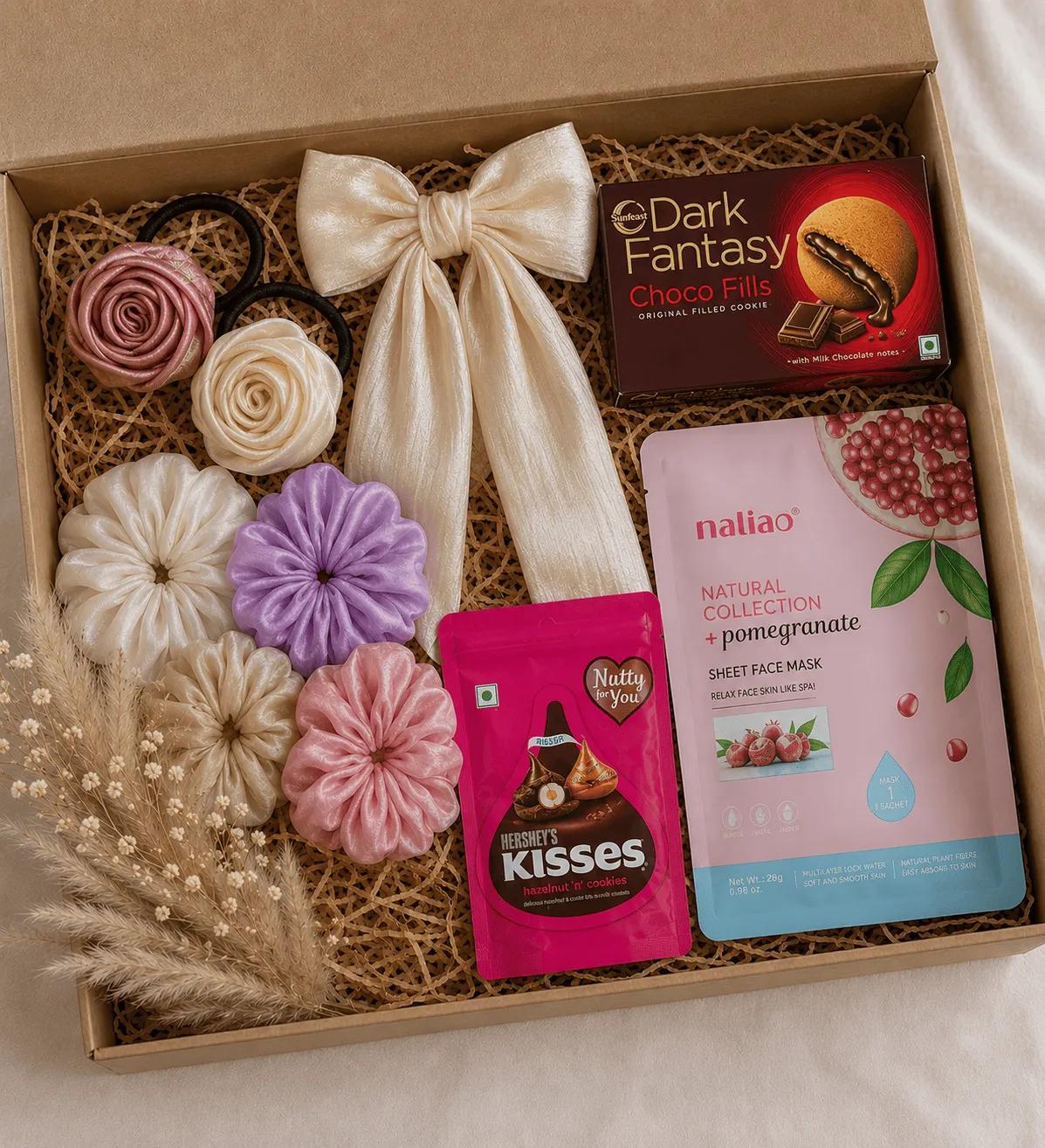 Kraft gift box hamper with satin hair ties, a scrunchie set, a face mask and chocolates