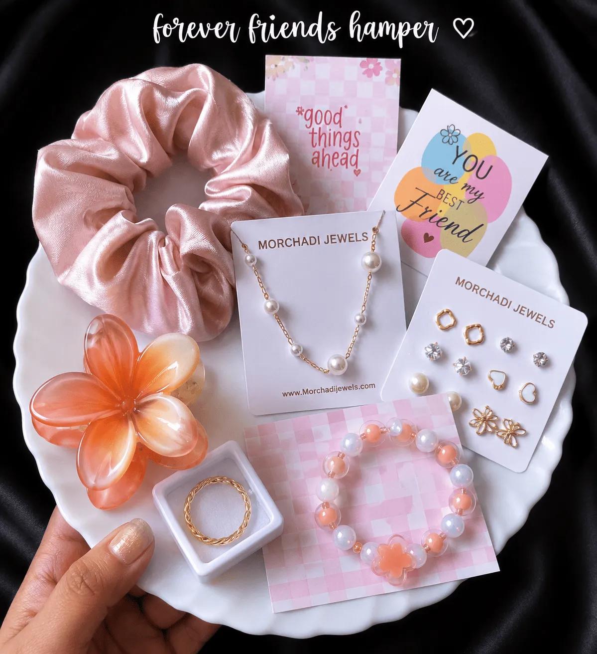 Friendship day hamper with a pearl-look necklace, stud earring cards and a beaded bracelet
