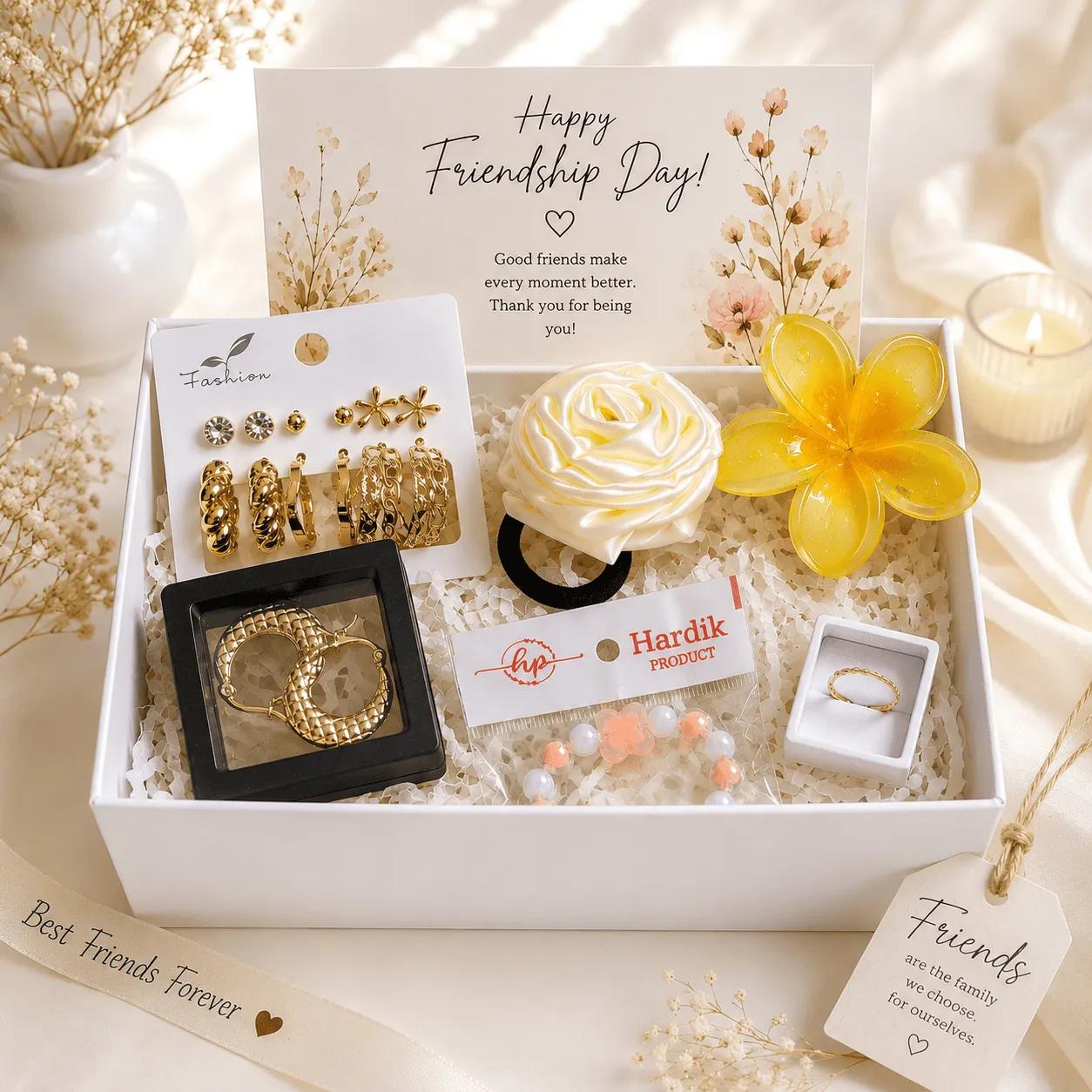 Friendship day gift box with gold-tone earring cards, a beaded bracelet and a hair tie