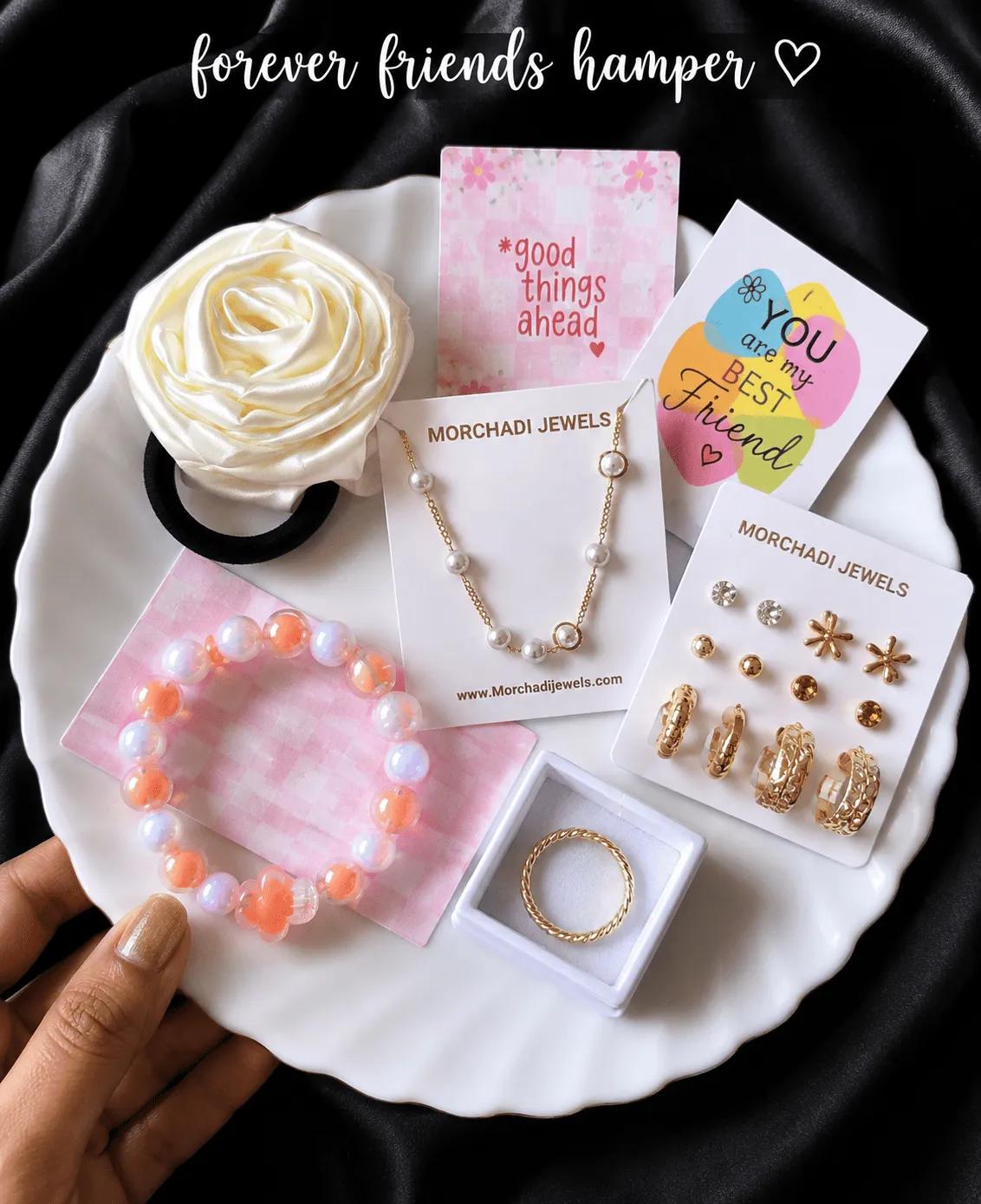 Friendship day gift set with a pearl-look necklace, earring cards and a beaded bracelet