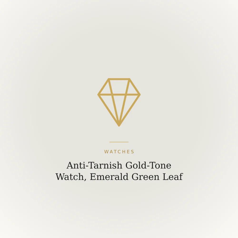 Gold-tone watch with a leaf-shaped emerald green dial and pearl-look accents