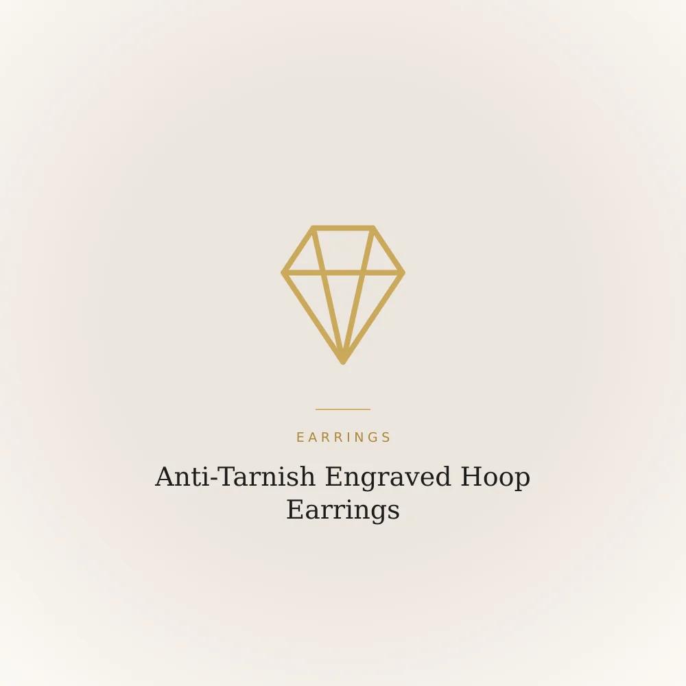 Engraved gold-toned stainless steel hoop earrings