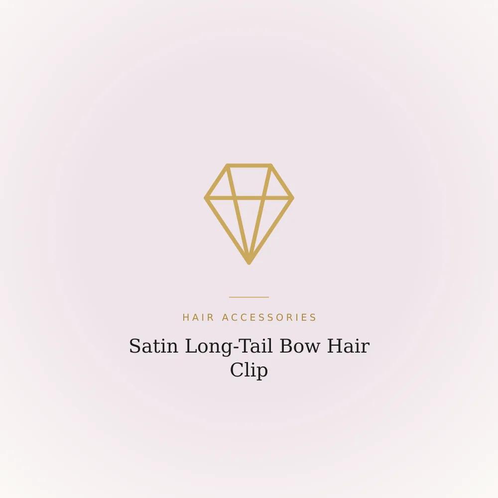 Satin long-tail bow hair clip with a flowing drape on an alligator clip
